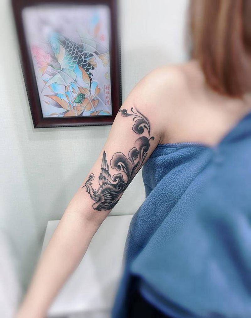遮盖凤凰纹身图片_手臂水墨纹身图案