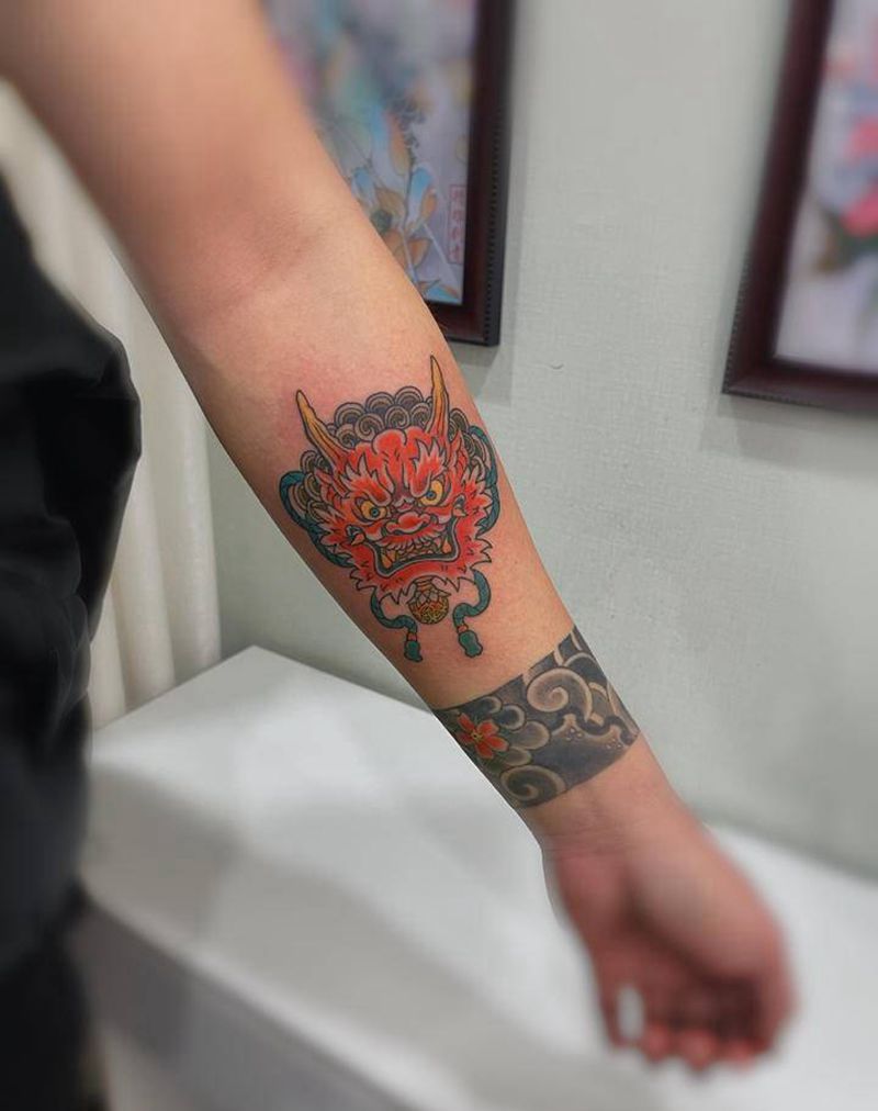 唐狮纹身图片_手臂老传统纹身图案