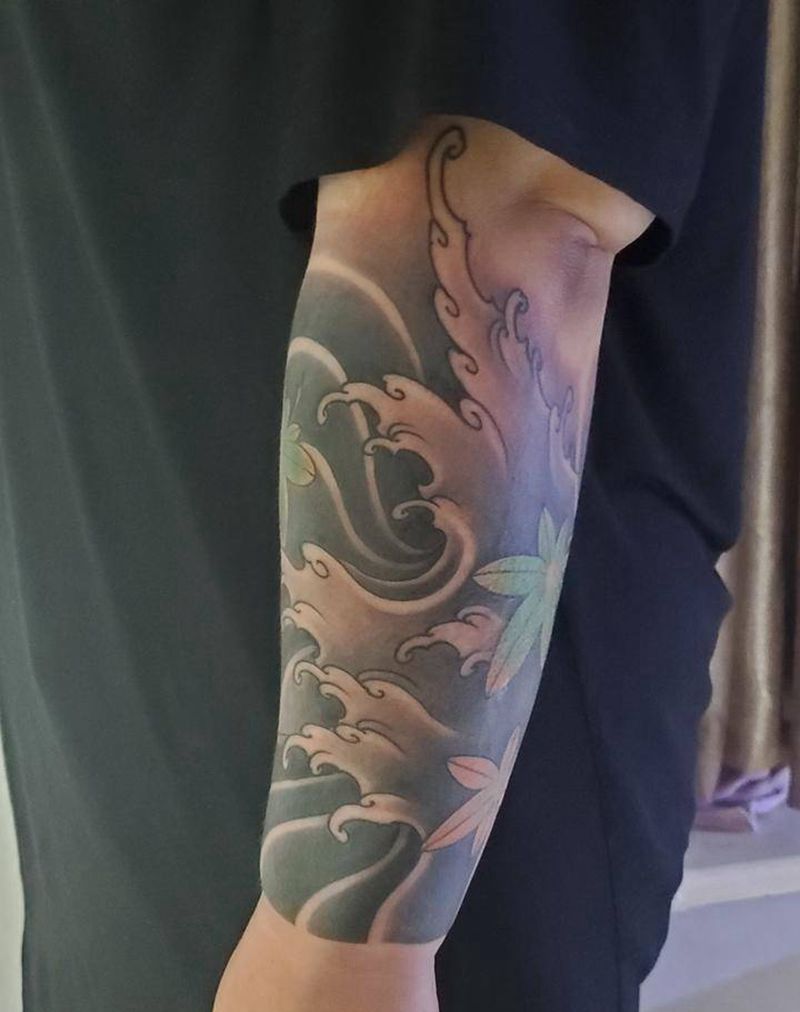 水浪包小臂纹身图片_手臂新传统纹身图案