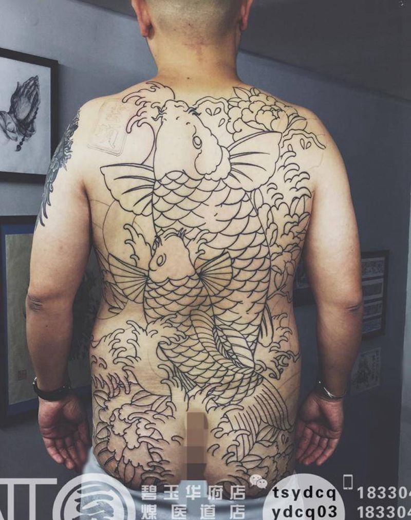 老传统鱼 未完待续纹身图片_成品背部传统动物原创纹身图案