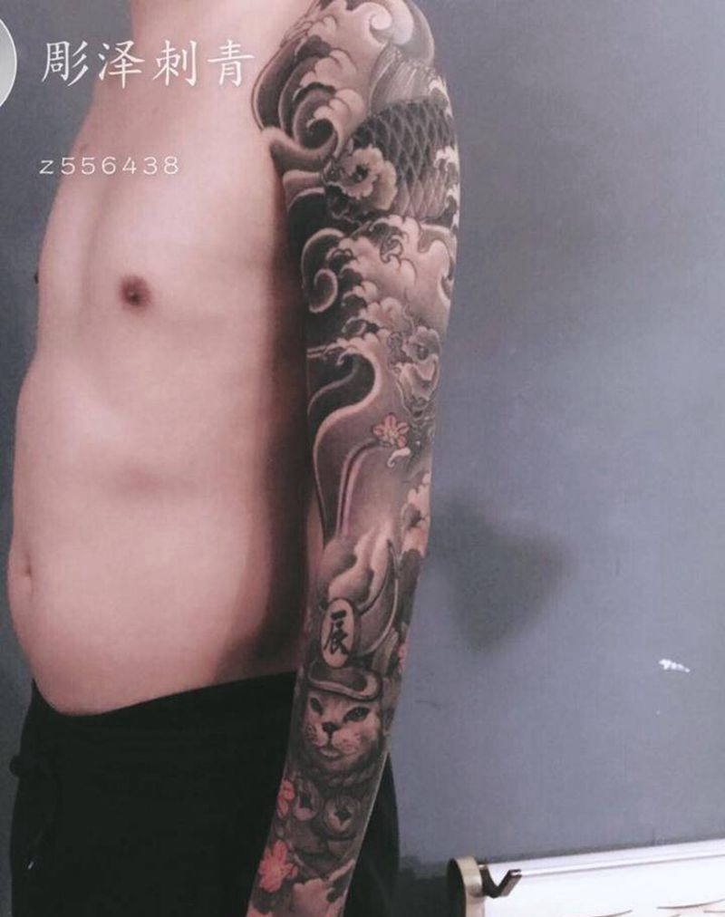 猫鱼纹身图片_手臂新传统纹身图案