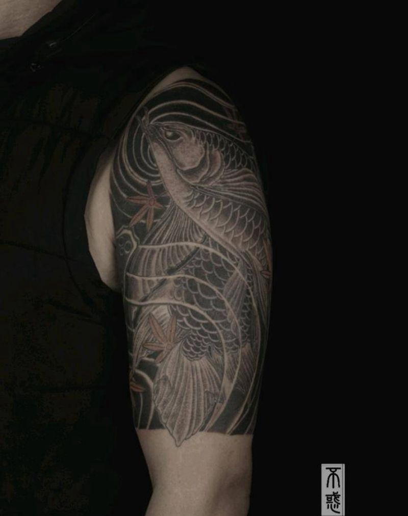 金龙鱼纹身图片_手臂新传统老传统鱼金龙鱼纹身图案