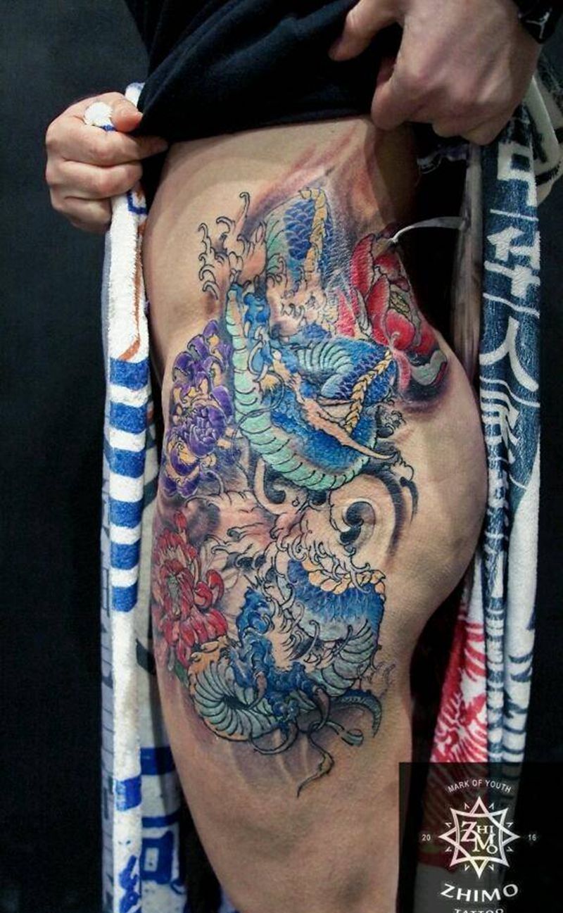龙与牡丹纹身图片