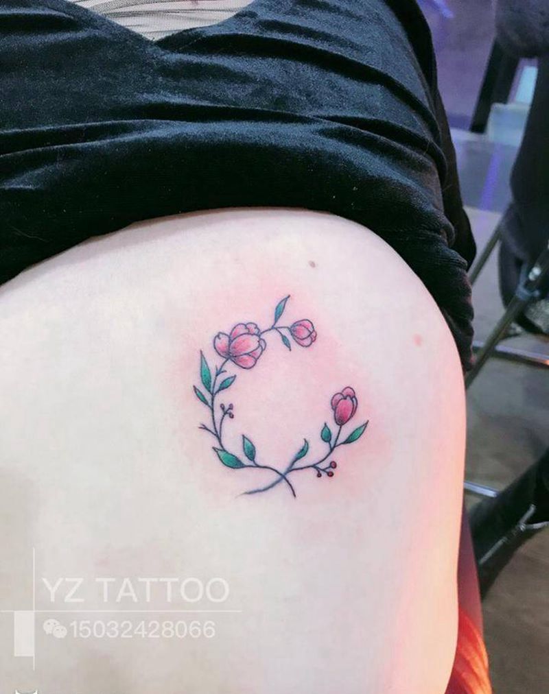 遮盖花纹身图片_腰部水彩纹身图案