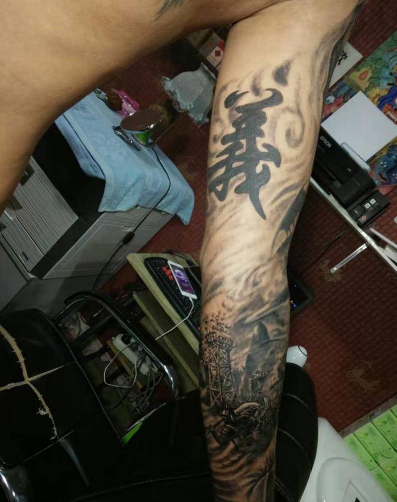 忠义智勇纹身图片_手臂人物纹身图案