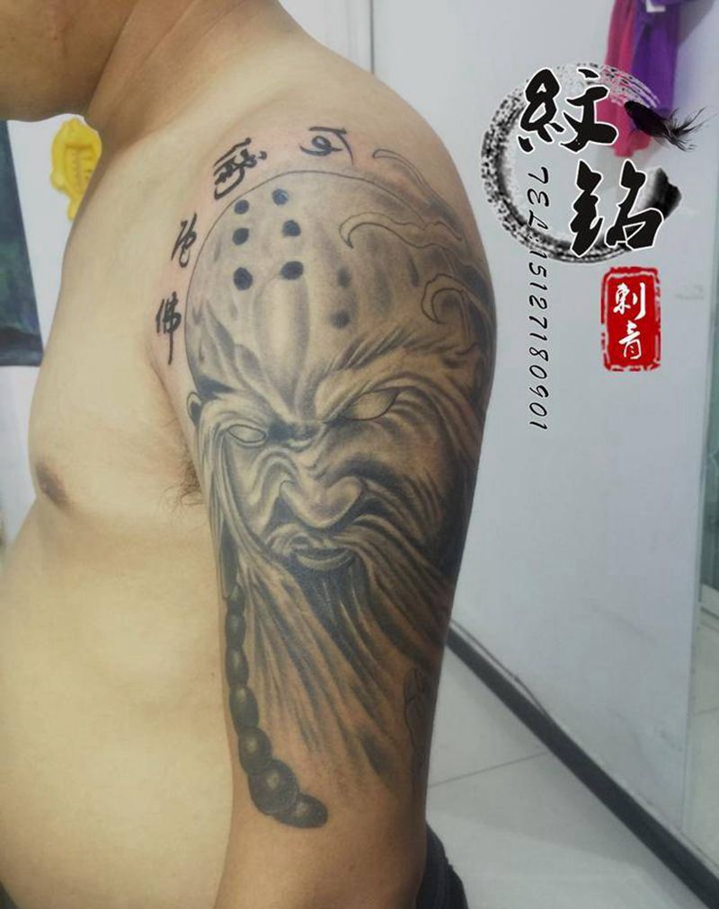 大臂降龙罗汉纹身图片