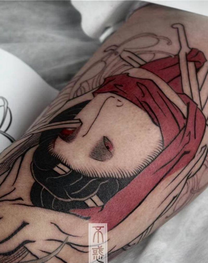 日式生首纹身图片_腿部老传统生首纹身图案