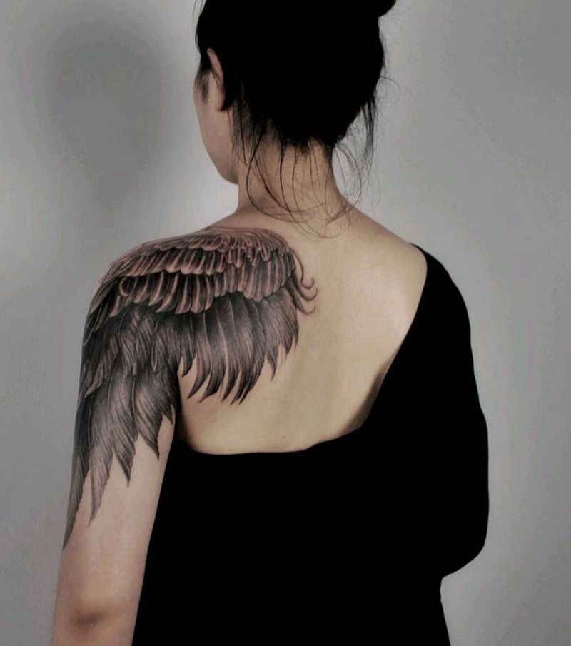 翅膀［遮盖］纹身图片_手臂欧美写实翅膀纹身图案