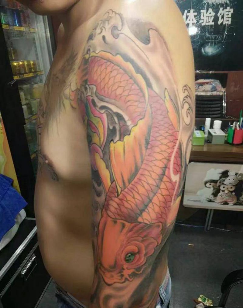 佛鱼纹身图片_手臂新传统佛鱼纹身图案