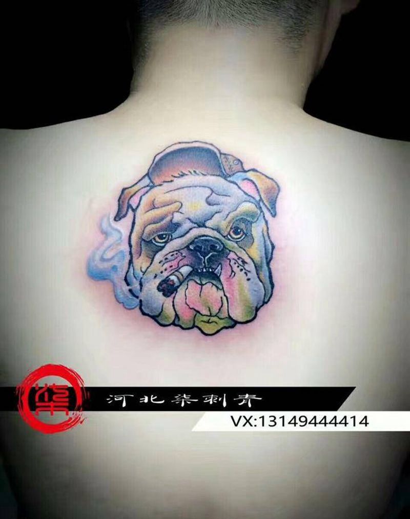 英牛纹身图片_成品背部传统动物清新纹身图案