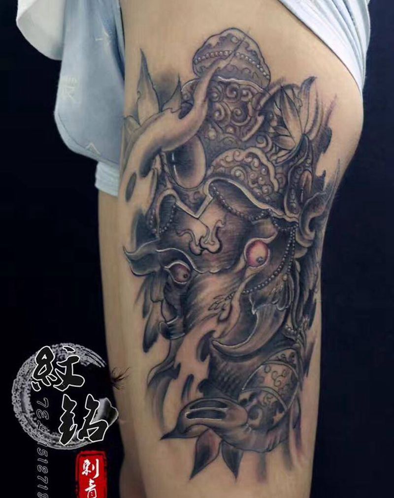 大腿象神纹身图片