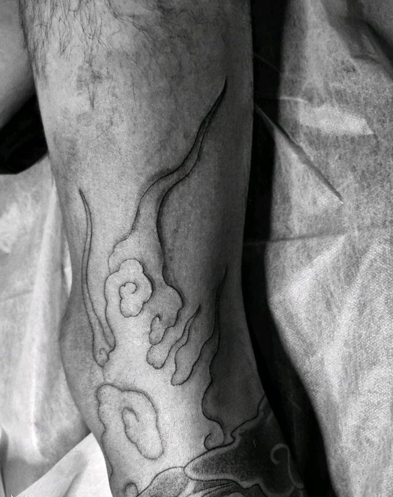 云纹身图片_腿部新传统云纹身图案