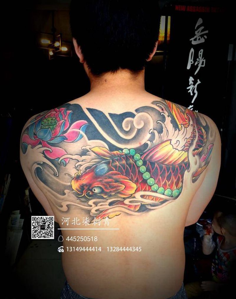 彩色鱼恢复后纹身图片_成品背部传统动物纹身图案