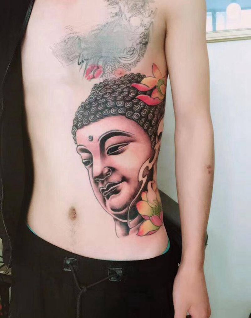 佛纹身图片_腰部肖像纹身图案