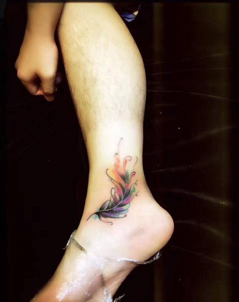 羽毛遮盖纹身图片