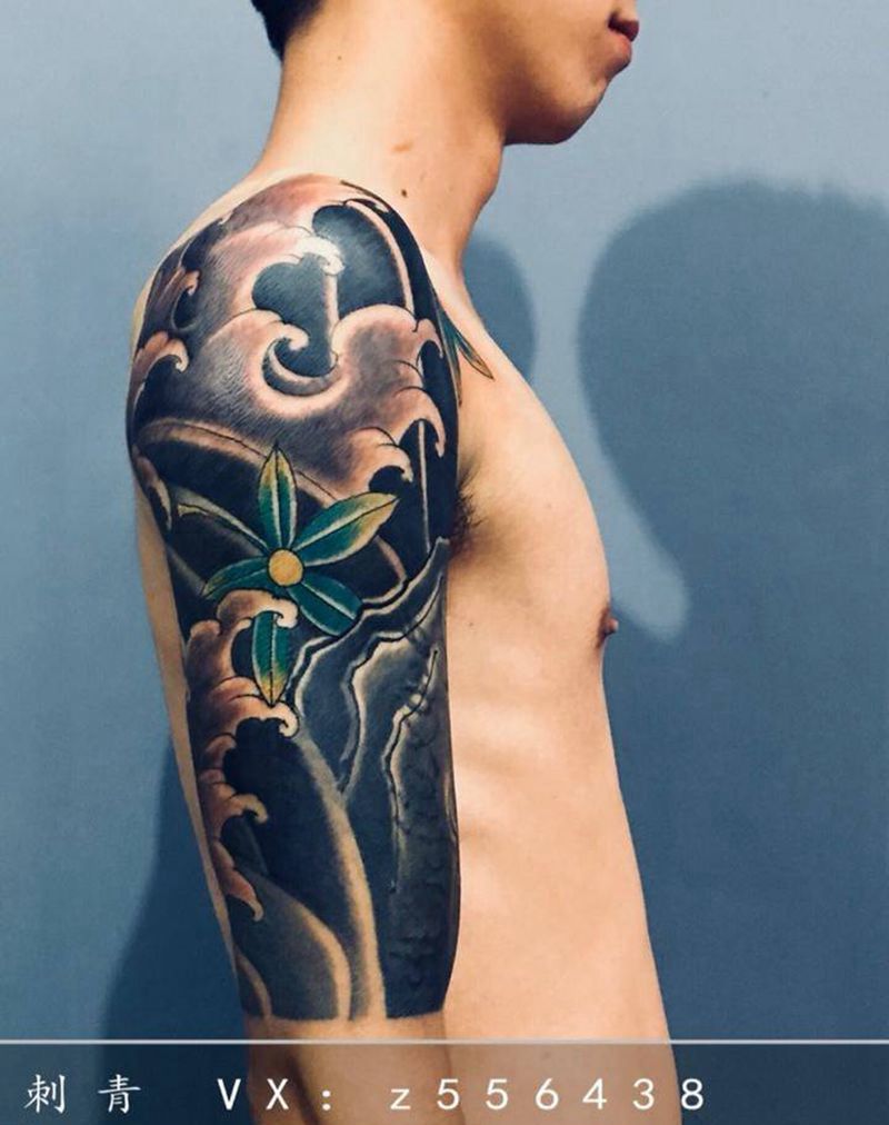 水浪遮盖纹身图片_手臂新传统纹身图案