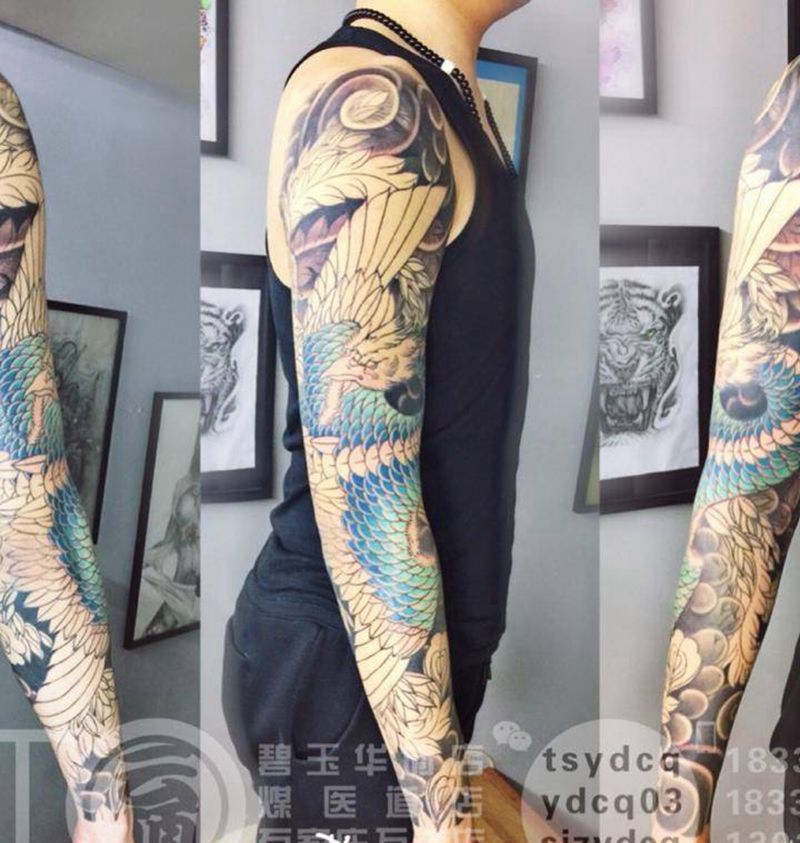 凤凰花臂 未完待续纹身图片_成品手臂传统习俗宗教动物鬼神原创纹身图案