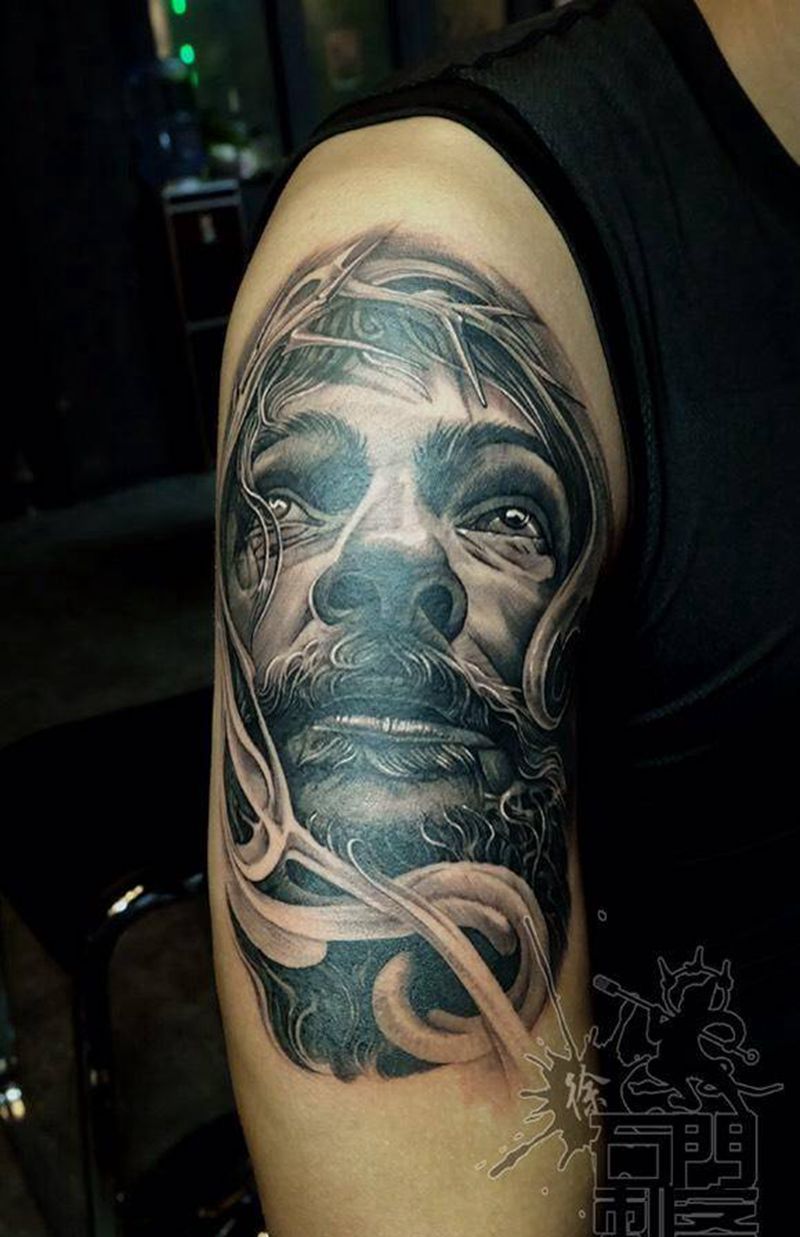 耶稣纹身图片_成品手臂欧美写实人物宗教纹身图案