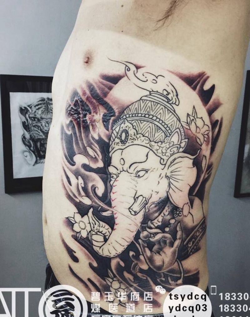 象神疤痕覆盖纹身图片_成品腰部传统习俗鬼神动物宗教原创纹身图案