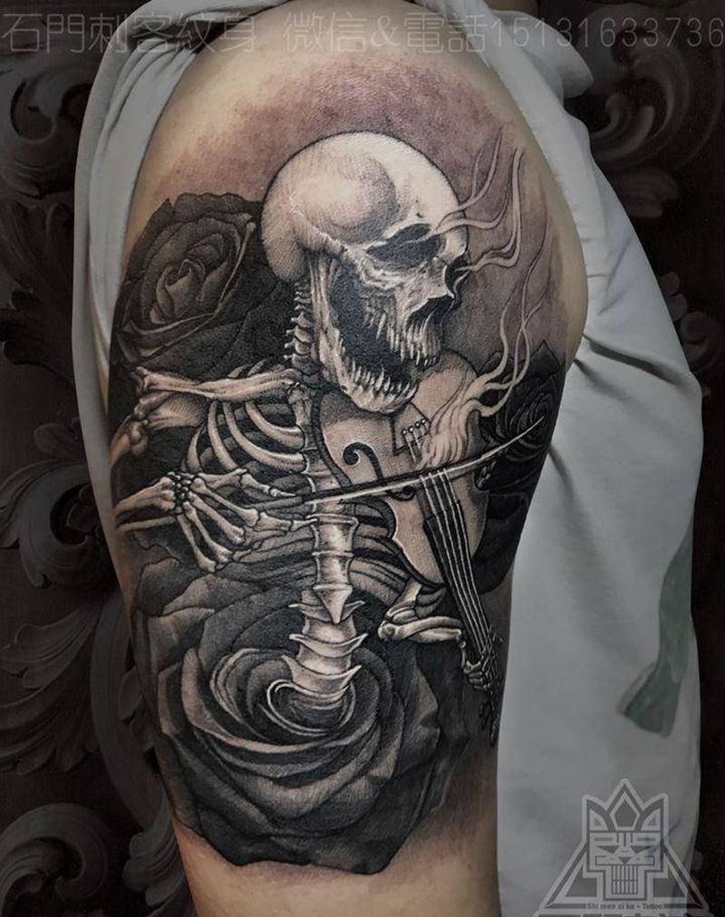 骷髅提琴纹身图片_手臂欧美写实骷髅玫瑰小提琴纹身图案
