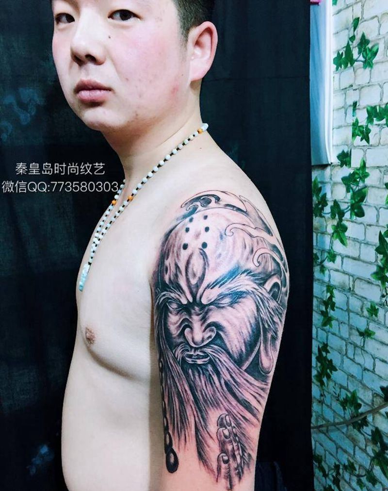 祥龙罗汉纹身图片