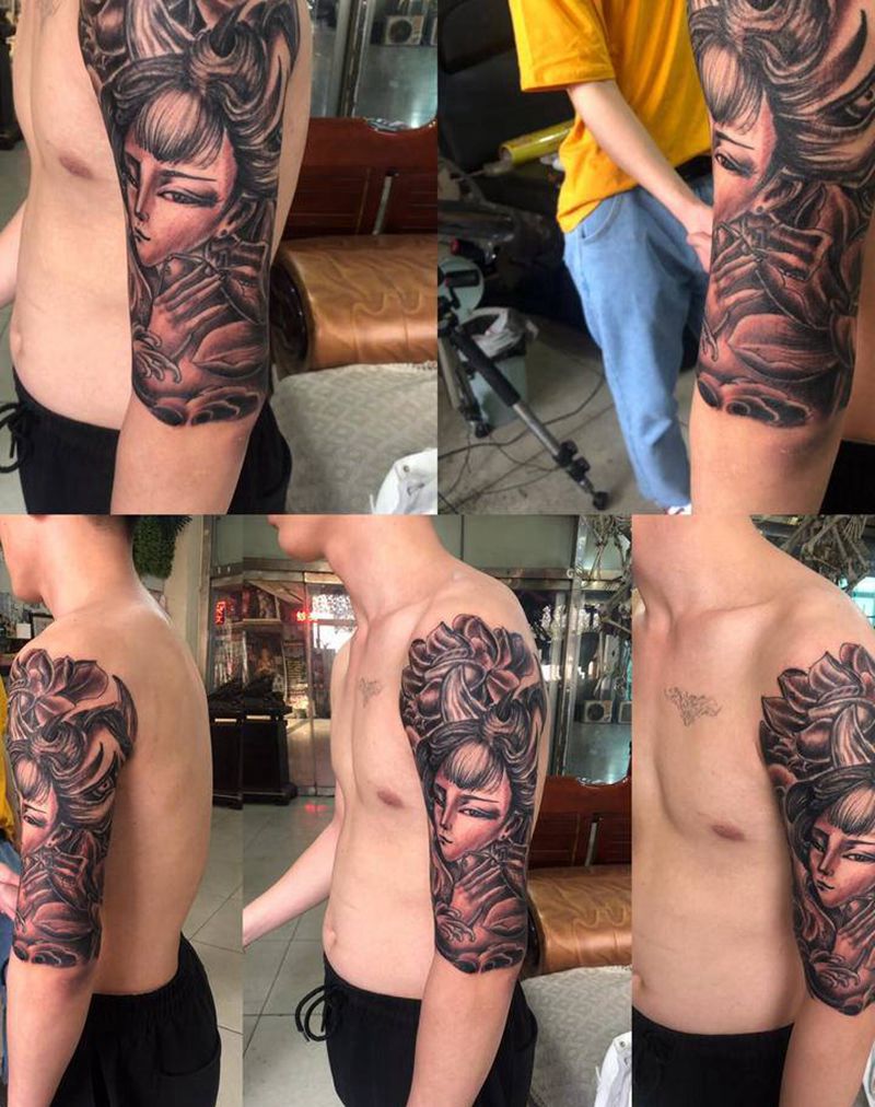 包大臂纹身图片_手臂纹身图案