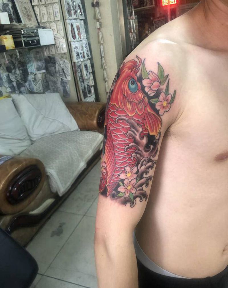 鱼纹身图片_手臂纹身图案