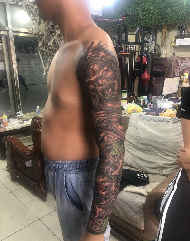 佛与魔纹身图片_手臂纹身图案