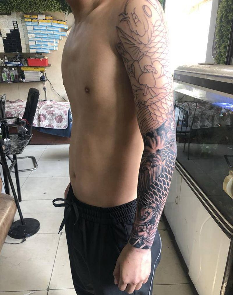 鱼纹身图片_手臂纹身图案