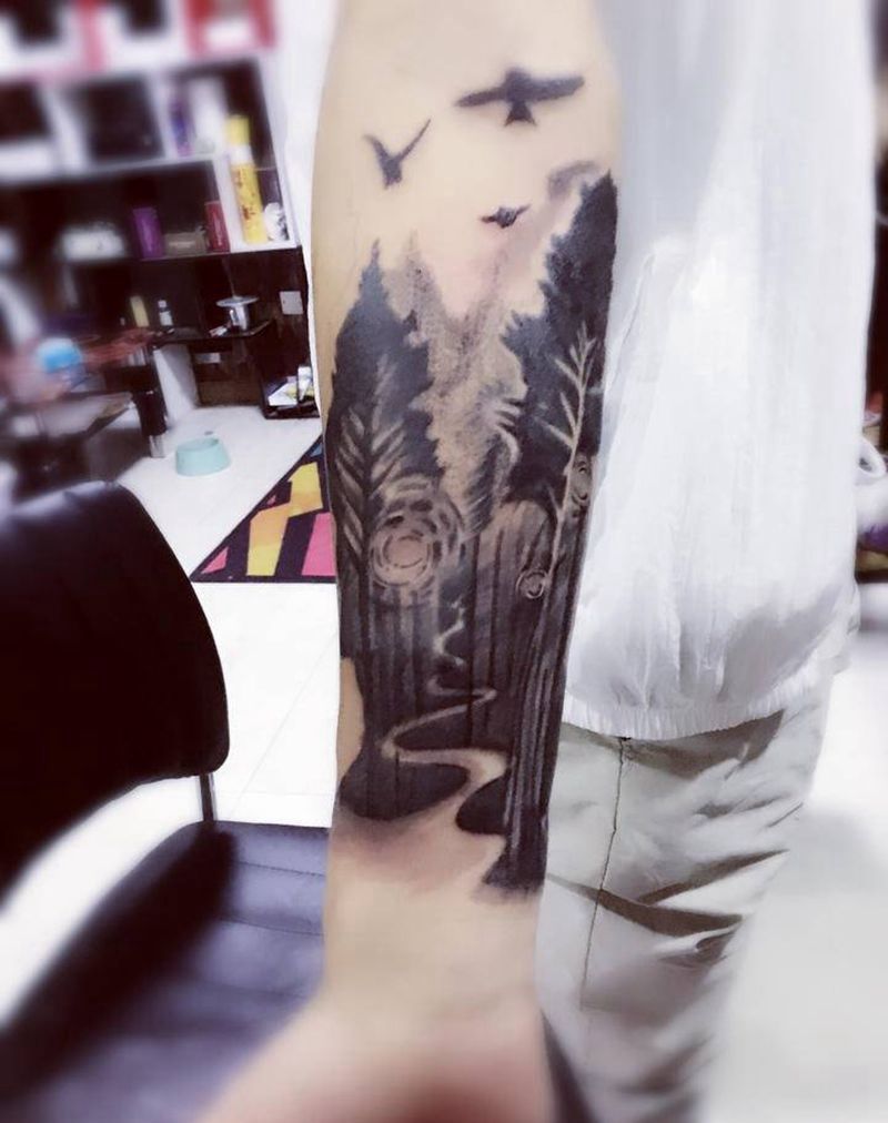 花臂一角纹身图片_欧美写实纹身图案