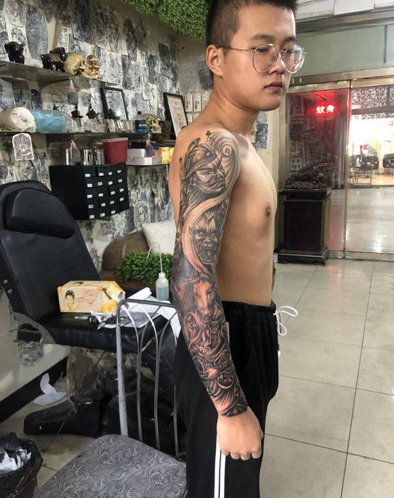 牛头马面纹身图片_手臂纹身图案