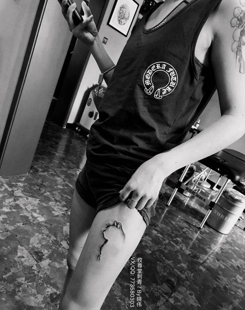 猫纹身图片_腿部点刺纹身图案