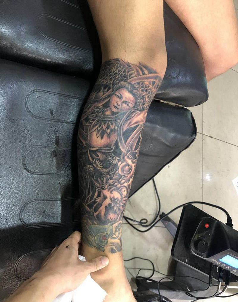 哪吒纹身图片_腿部纹身图案