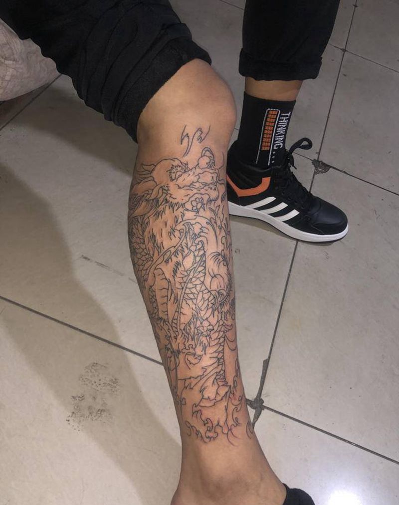 麒麟纹身图片_腿部纹身图案