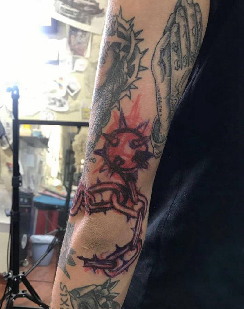 Freestyle挣脱束缚纹身图片_手臂纹身图案