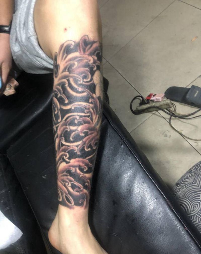 浪花纹身图片_腿部纹身图案