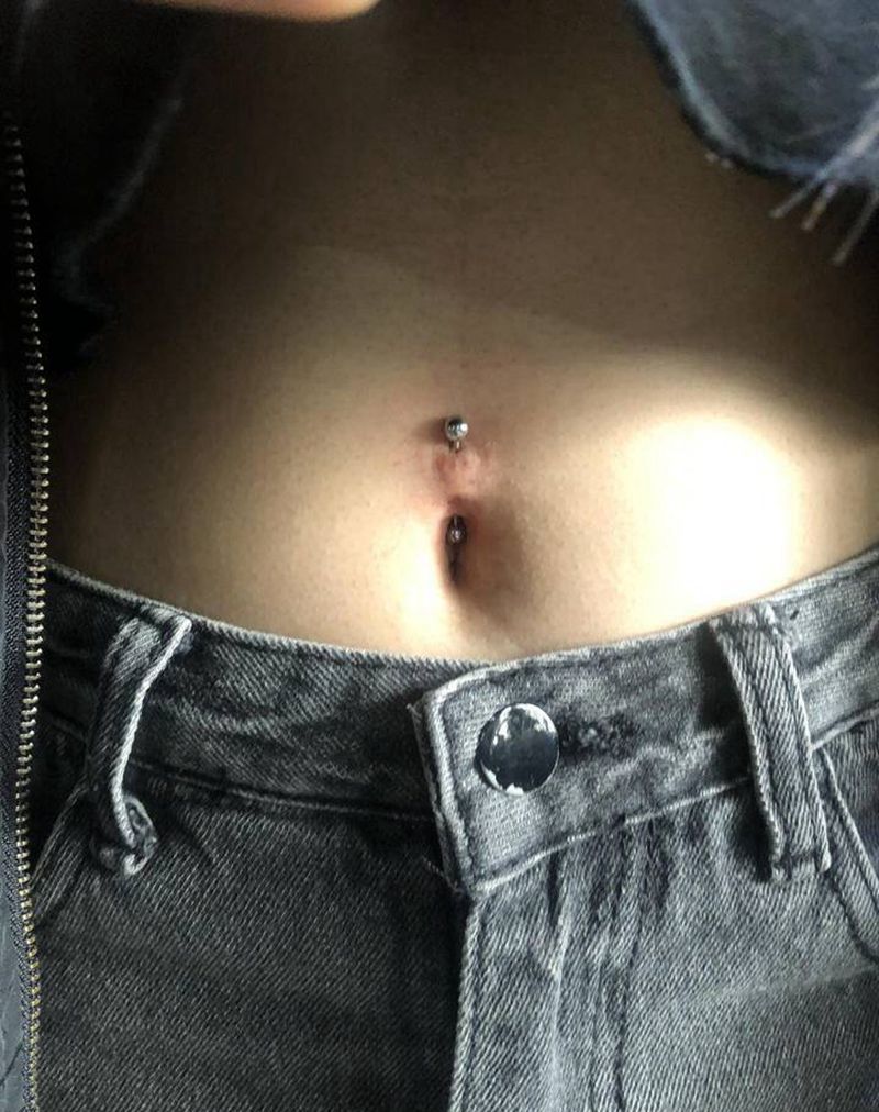 穿刺纹身图片_腹部纹身图案