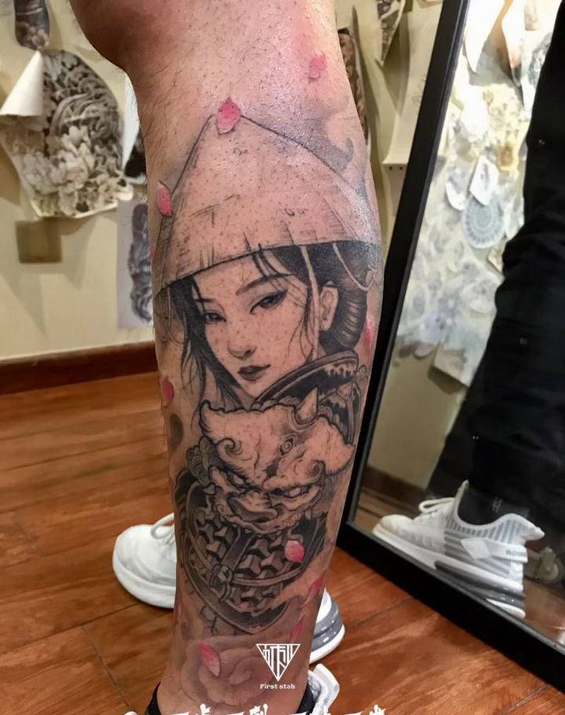 戎装女子纹身图片_腿部纹身图案