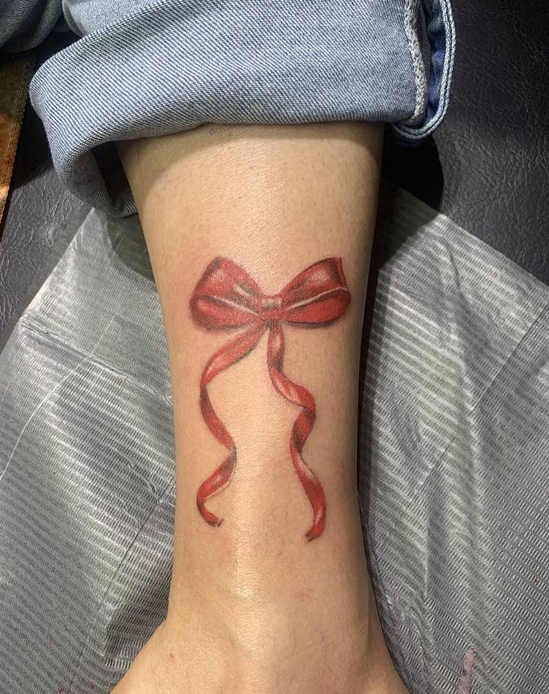 蝴蝶结纹身图片_腿部纹身图案