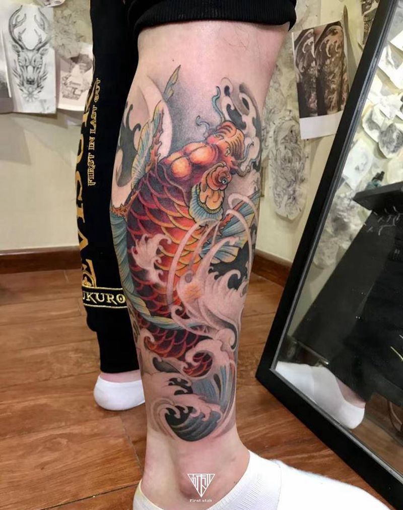 鱼与荷纹身图片_腿部纹身图案