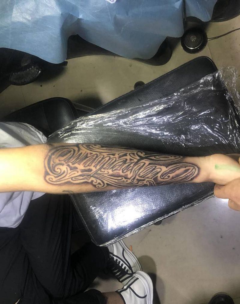 花体英文纹身图片_手臂纹身图案