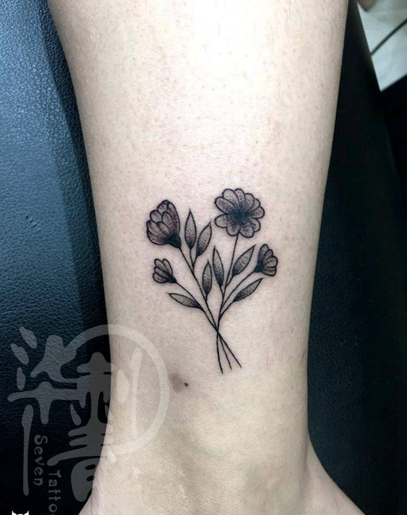 小花纹身图片_腿部点刺纹身图案