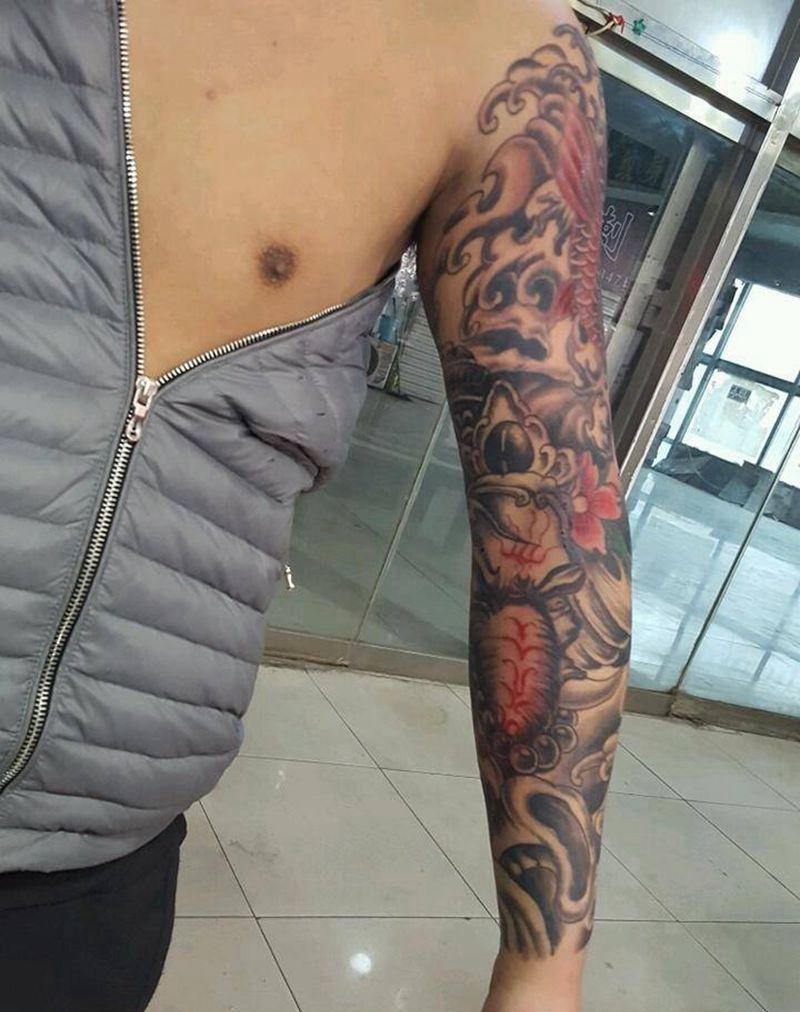 花臂（大臂鱼是修改的纹身图片