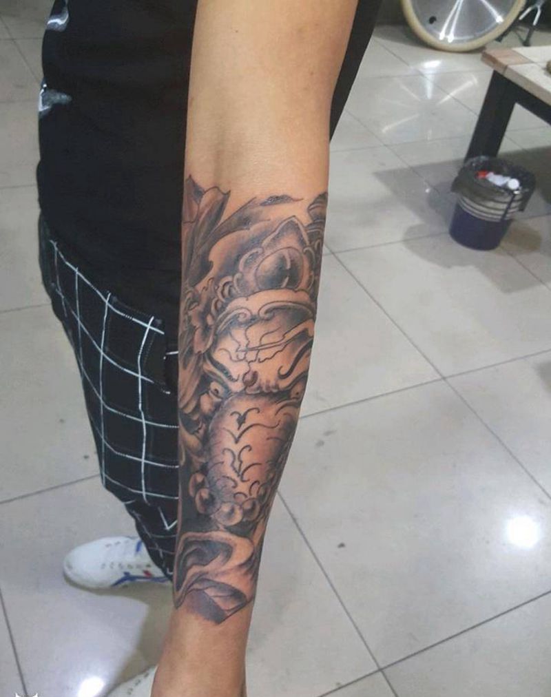 包小臂象神纹身图片