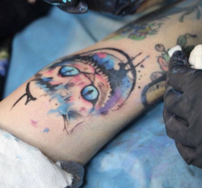 柴郡猫，坏坏的笑！喜欢做完以后的眼睛。纹身图片