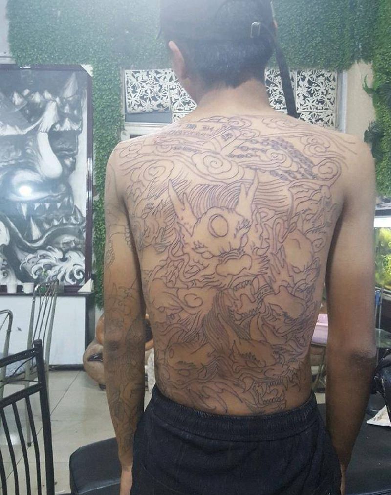 九龙拉棺纹身图片