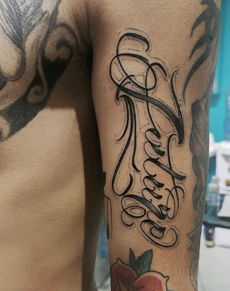 花体字纹身图片_手臂花体字纹身图案