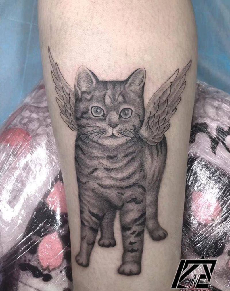 小腿猫咪纹身图片_腿部欧美写实纹身图案