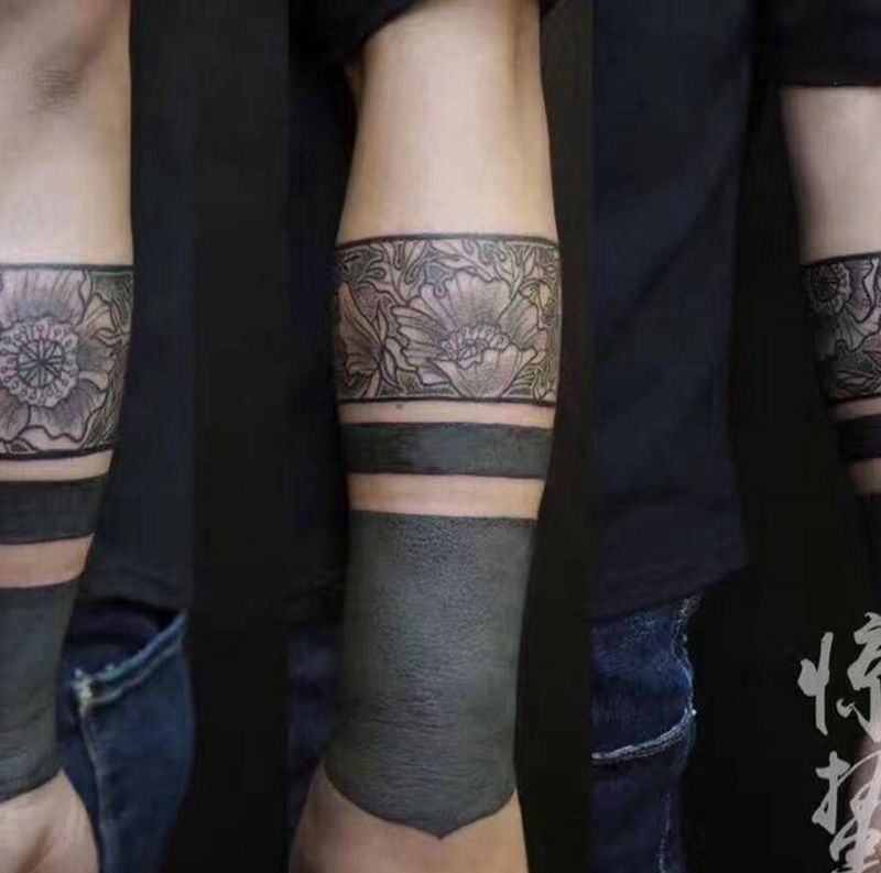 黑臂花环纹身图片_成品手臂传统清新图案纹身图案