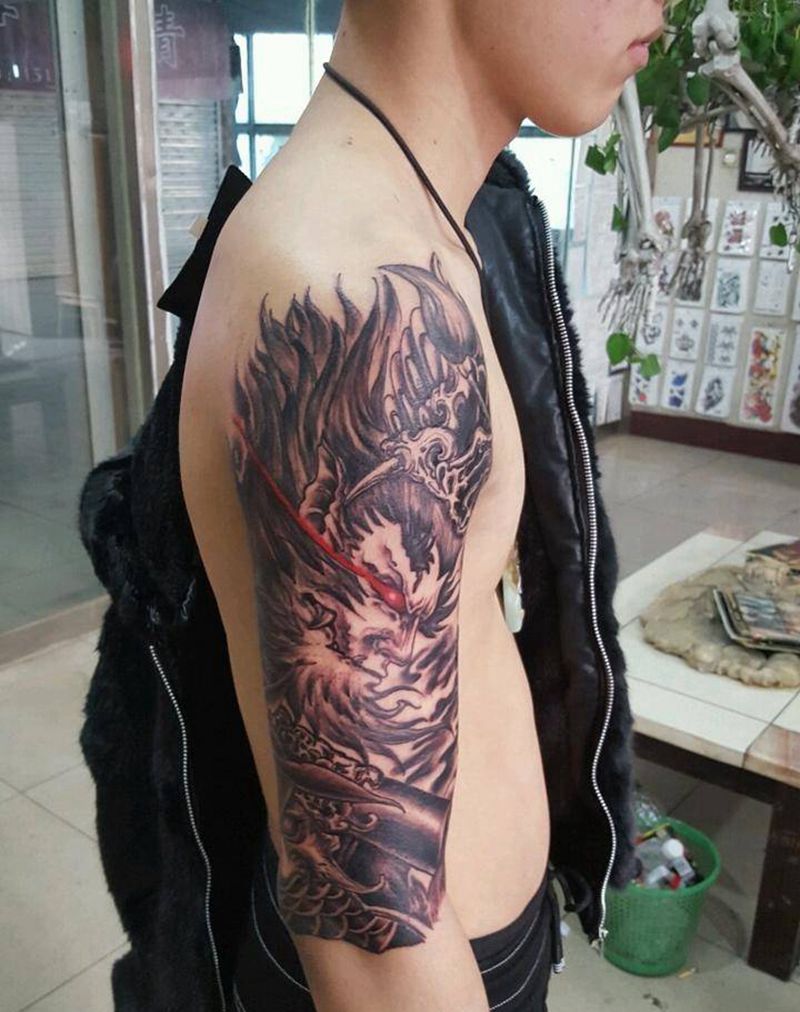 斗战胜佛包大臂纹身图片